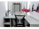 Bright vanity with large mirror and a variety of storage options, perfect for makeup and accessories at 2147 Whitfield Ln, Orlando, FL 32835