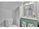 Charming bathroom featuring a new vanity and toilet at 216 E Vanderbilt St, Orlando, FL 32804