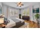 Comfortable bedroom with hardwood floors and large windows at 216 E Vanderbilt St, Orlando, FL 32804