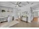 Airy office space with tiled floor, bright grey walls, and a view to the living room at 216 E Vanderbilt St, Orlando, FL 32804