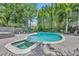 Private pool and spa with a custom tile surround are perfect for relaxation and outdoor fun at 216 E Vanderbilt St, Orlando, FL 32804