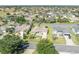 Overhead view of house with defined borders, landscaping, and in a golf community at 2192 Kerwood Loop, The Villages, FL 32162