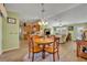 Open floor plan blending dining, kitchen, and living areas for easy entertaining at 2192 Kerwood Loop, The Villages, FL 32162