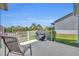 Enjoy the outdoors on this cozy patio with a grill and relaxing seating at 2192 Kerwood Loop, The Villages, FL 32162
