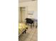Bright bedroom featuring a desk, chair, and spacious closet space for optimal organization at 2218 Abbey Rd, Winter Haven, FL 33880