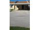 Charming townhouse with a covered carport and well-maintained front yard at 2218 Abbey Rd, Winter Haven, FL 33880