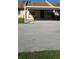 Charming townhouse with a covered carport and well-maintained front yard at 2218 Abbey Rd, Winter Haven, FL 33880