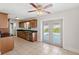 Eat-in kitchen with views to the pool area, granite countertops, stainless steel appliances at 2314 Meadowbrook St, Kissimmee, FL 34744