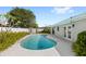 Backyard swimming pool with patio and landscaping near the home's exterior at 2314 Meadowbrook St, Kissimmee, FL 34744