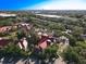 An aerial view of a condo complex, showcasing lush greenery and a well-maintained exterior at 232 Afton Sq # 201, Altamonte Springs, FL 32714