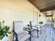 A serene outdoor space with chairs and a table, ideal for enjoying the fresh air at 232 Afton Sq # 201, Altamonte Springs, FL 32714