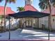 The clubhouse entrance features a covered walkway, offering convenient access for residents and guests at 232 Afton Sq # 201, Altamonte Springs, FL 32714