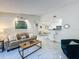 Inviting living room with modern decor, bar seating, and an open floor plan at 232 Afton Sq # 201, Altamonte Springs, FL 32714