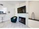 Cozy living area with fireplace and bar access, ideal for relaxing or entertaining guests at 232 Afton Sq # 201, Altamonte Springs, FL 32714