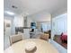 Open-concept living area seamlessly connects the kitchen, dining space, and living room at 232 Afton Sq # 201, Altamonte Springs, FL 32714