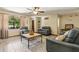 Spacious living room showcasing tile floors, comfortable furniture, and a serene atmosphere at 255 Katrina St, De Leon Springs, FL 32130