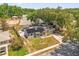 Aerial view of home showing solar panels, landscaping and mature trees at 260 3Rd St, Winter Springs, FL 32708