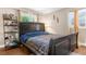 This bedroom has a large bed and windows that provide plenty of natural light at 260 3Rd St, Winter Springs, FL 32708