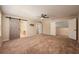 Large bedroom features a ceiling fan, carpet, and multiple closets at 2611 Albion Ave, Orlando, FL 32833