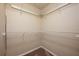 Walk-in closet featuring white wire shelving, providing ample storage space at 2611 Albion Ave, Orlando, FL 32833