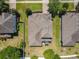 Aerial view showing roof and backyard with screened patio and nice backyard at 2983 Park Meadow Dr, Apopka, FL 32703