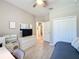 Bedroom with a daybed, white furniture, and doorway to the hall at 2983 Park Meadow Dr, Apopka, FL 32703