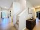 Hallway featuring a staircase and neutral walls at 2983 Park Meadow Dr, Apopka, FL 32703