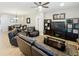 Comfortable living room featuring a ceiling fan and view into the dining area at 2983 Park Meadow Dr, Apopka, FL 32703