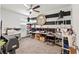 Multi-purpose room with bold black and white stripes, ceiling fan and multiple work spaces at 3065 Timber Hawk Cir, Ocoee, FL 34761