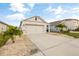 Charming single-Gathering home with a well-maintained lawn, stone accents, and a two-car garage at 3065 Timber Hawk Cir, Ocoee, FL 34761