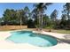 Backyard pool with spa surrounded by mature trees, perfect for outdoor relaxation and privacy at 3200 Town And Country Rd, Oviedo, FL 32766