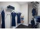Spacious walk-in closet with wire shelving, providing ample storage for clothes and accessories at 3285 Songbird Cir, Harmony, FL 34773