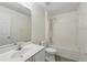 Well-lit bathroom featuring a single sink vanity, a toilet, and a shower at 343 Grand Royal Cir, Winter Garden, FL 34787