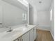 Clean bathroom with a double sink vanity, a mirror, and a soaking tub at 343 Grand Royal Cir, Winter Garden, FL 34787
