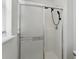 Modern shower stall with sleek sliding glass doors and a contemporary shower head at 343 Grand Royal Cir, Winter Garden, FL 34787