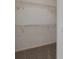 Spacious walk-in closet with wire shelving and neutral carpeting at 343 Grand Royal Cir, Winter Garden, FL 34787