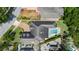 Aerial view of the home showcasing the pool, backyard, landscaping, and proximity to surrounding neighborhood at 3535 Lake Sarah Dr, Orlando, FL 32804