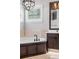 Close up of a luxurious bathroom showcasing a soaking tub and vanity, designed for relaxation at 3535 Lake Sarah Dr, Orlando, FL 32804