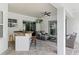 Cozy outdoor living space with a bar, seating area, and ceiling fan at 3535 Lake Sarah Dr, Orlando, FL 32804