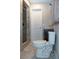 Bathroom featuring stylish tiled shower with built-in niche, and sleek fixtures at 36019 Clear Lake Dr, Eustis, FL 32736