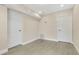Finished basement offering a versatile space with tile flooring and neutral paint, perfect for customization at 3713 Dover St, Orlando, FL 32806
