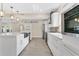 Contemporary kitchen featuring a large island, stainless appliances, and stylish finishes at 3713 Dover St, Orlando, FL 32806