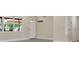 Bright, airy living room features light-colored walls and multiple entry points at 3713 Dover St, Orlando, FL 32806