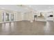 Open-concept living space with updated flooring and an inviting kitchen area in view at 3713 Dover St, Orlando, FL 32806