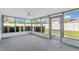 Covered and screened outdoor porch area for comfortable relaxation and outdoor entertainment at 3713 Dover St, Orlando, FL 32806