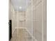 A spacious walk-in closet with custom shelving solutions provides ample storage space at 3713 Dover St, Orlando, FL 32806