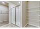 Bathroom with a glass shower and a walk-in closet at 439 Sarah Nicole Way, New Smyrna Beach, FL 32168
