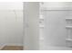 Bright bathroom featuring a tub and shower combo, and a closet at 4497 Yaupon Holly Way, Lakeland, FL 33811