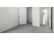 A neutral bedroom features plush gray carpeting and a walk-in closet for ample storage at 4497 Yaupon Holly Way, Lakeland, FL 33811