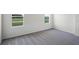Spacious bedroom with carpet flooring and a window view at 4497 Yaupon Holly Way, Lakeland, FL 33811